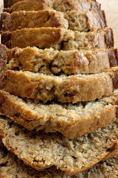 A sliced loaf of moist banana nut bread. Moist Dense Banana Bread, Easy Delicious Banana Bread, Banana Bread Recipe With Cinnamon, Banana Nut Bread Recipe Healthy, Best Banana Nut Bread Recipe Moist, Banana Bread Recipe With Mayonnaise, Banana Cinnamon Bread Recipe, Banana Bread 5 Bananas, Mayonnaise Banana Bread