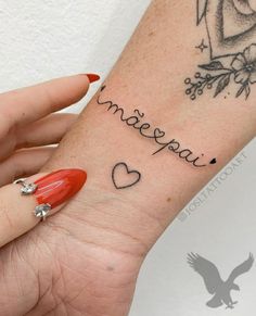 a woman's arm with a tattoo that says i love you on the wrist