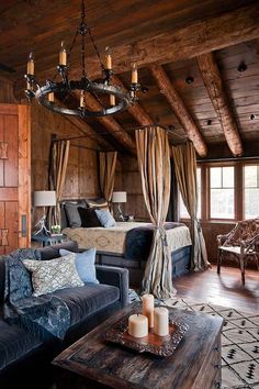 a bedroom with wood paneled walls and wooden ceilinging is decorated in rustic style