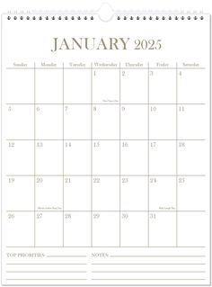 a calendar with the word january in gold and white, on top of a page