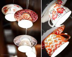 tea cups are hanging from the ceiling in different colors and designs, with one being blown off