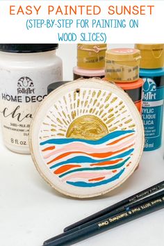 an easy painted sunset step - by - step for painting on wood slices