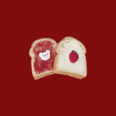 two pieces of bread with fruit on them and a bear face painted on the side