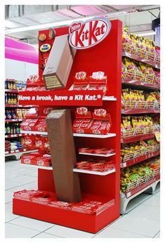 a display in a grocery store filled with lots of different types of food and drinks