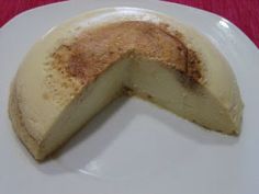 a piece of cheesecake sitting on top of a white plate