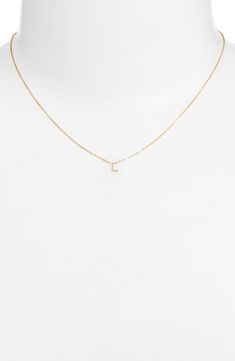 Personalize your stack with this layering-friendly necklace centered with a dainty pendant of your favorite initial filled with 14-karat yellow gold. 16" length 14k-gold fill Made in the USA Dainty 14k Yellow Gold Filled Initial Necklace, Delicate Yellow Gold Initial Necklace With Delicate Chain, Delicate Yellow Gold Initial Necklace With Chain, Minimalist 14k Gold Filled Initial Necklace In Yellow Gold, Minimalist 14k Gold-filled Initial Necklace In Yellow Gold, Minimalist 14k Gold-filled Initial Necklace, Dainty Initial Pendant Necklace For Layering, Initial Pendant Necklace With Delicate Chain For Layering, Minimalist Initial Pendant Charm Necklace For Layering