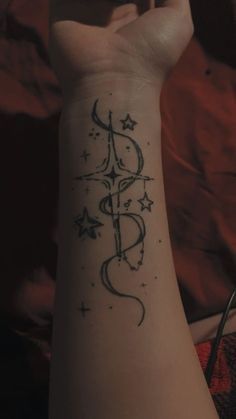 a person with a tattoo on their arm