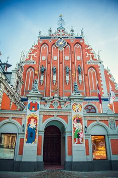 an old building with many paintings on it