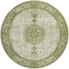 a green and white rug with an intricate design on the center, in front of a white background