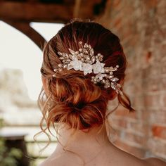 Create a picture-perfect bridal look with our exquisite Bridal Hair Comb adorned with delicate white flowers, pearl beads and sparkling clear crystals. This enchanting hair accessory is designed to add a touch of elegance and romance to your wedding hairstyle, making you look and feel like a true princess on your special day. With its timeless beauty and intricate detailing, this bridal hair comb is a must-have accessory for every bride-to-be. The beautiful flowers are made from porcelain which add delicate bohemian vibes. Flower Bridal Hair, Floral Headpiece Wedding, Pearl Accessories, Bridal Hair Flowers, Handmade Headbands, Wedding Hairstyle, Bridal Headpiece, Porcelain Flowers, Bridal Look