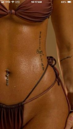 Subtle Tattoos For Black Women, Hip Tattoos On Black Women, Hip Crease Tattoos Women, Quote Tattoos Back, Fine Line Stomach Tattoo, Hidden Tattoos Black Women, Easy To Hide Tattoo Placement, Back Tattoo Writing, Side Of Stomach Tattoo