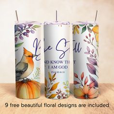 three candles with the words, life is beautiful and one candle has an image of a bird on it