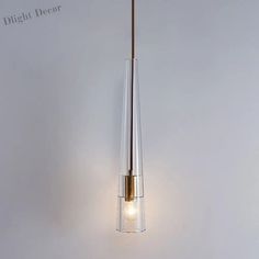 a light that is hanging from the ceiling with some lights on it's side