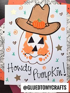 a handmade halloween card with a pumpkin wearing a hat