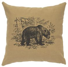 a brown pillow with a black bear on it