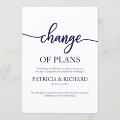 the change of plans card is shown on top of a white marble surface with black ink