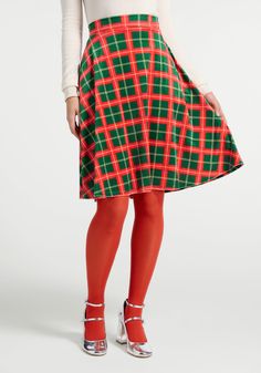 With a frosty sheen, this velvet circle skirt from our ModCloth label is delightfully festive in an exclusive red and green plaid print ! Made from stretchy woven velvet, this high-waisted A-line skirt features an elasticized waistband for an elevated pull-on style that finishes beautifully at the knee. 93% Polyester, 7% Spandex Fabric provides stretch Side pockets Elasticized panel at back waist provides stretch Elevated pull-on style Fitted at the high-waist Imported Model Measurements: HEIGHT Holiday Party Pants, Velvet Circle Skirt, Velvet Bottoms, Plus Size Vintage Clothing, Designer Plus Size Clothing, Statement Outfit, Gingham Skirt, Christmas Outfits Women, Plus Size Cocktail Dresses