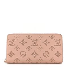 This is an authentic LOUIS VUITTON Mahina Zippy Wallet in Magnolia. This stunning clutch wallet is beautifully crafted of Louis Vuitton monogram perforated leather in pink.  The wallet zips open to a matching leather interior lined with card slots, patch pockets, and a zipper pocket. Luxury Pink Bifold Wallet, Lv Zippy Wallet, Louis Vuitton Wallet Pink, Louis Vuitton Zip Wallet, Zippy Xl Wallet Louis Vuitton, Perforated Leather, Authentic Louis Vuitton, Leather Interior, Clutch Wallet