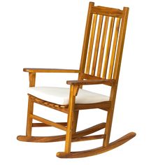 a wooden rocking chair with white cushions