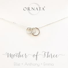 “Mother of Three” Personalized Sterling Silver Necklace | One Adult  & Three Children | “Mother of Three” sterling silver necklace. Families come in all shapes and sizes. Ornata specializes in creating beautiful sterling silver jewelry that celebrates the unique constellations of family for the women who hold them dear. This design features one large and three small sterling silver freely moving rings. Hammered Silver Jewelry, Three Children, Jewelry Card, Kids Jewelry, Sterling Silver Necklace, Cute Jewelry, Just For Me, Bling Bling, Sterling Silver Necklaces