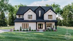 a white and black house with lots of windows on the front porch is surrounded by green grass