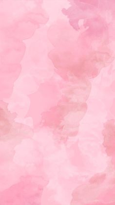 an abstract pink background with watercolor paint