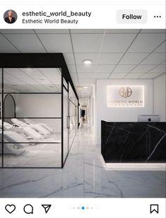 an image of a white and black bathroom with marble flooring on the walls, along with text that reads aesthetic world beauty