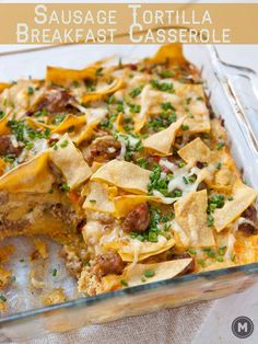 this sausage tortilla casserole is loaded with meat, cheese and vegetables