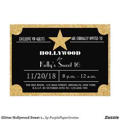 a black and gold hollywood ticket with a star on the front, it is shown