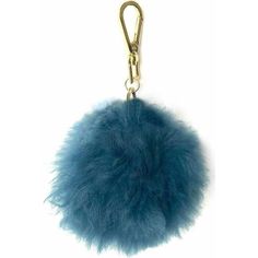 a blue furry ball keychain hanging from a metal hook