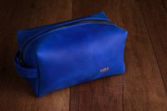 stylish blue leather unisex cosmetic bag is a great gift for any ocasion Men Birthday, 3rd Anniversary