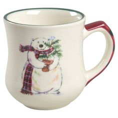 a white mug with a polar bear holding a christmas tree