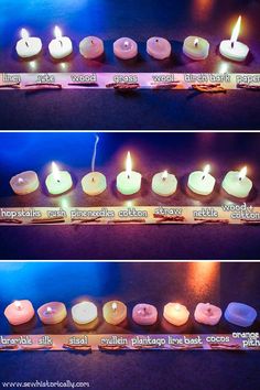 several candles are lit in different colors and sizes on a table with the words happy birthday written below them