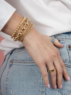 Add a touch of bubbly charm to your style with the Double Bubble Stretch Bracelet! Made with alternating 10mm and 6mm gold fill beads, this stretch bracelet is perfect for adding a playful twist to any outfit. Stretchy and easy to wear, it's a must-have for any jewelry lover. Gold Trendy Stretch Bracelet With Spacer Beads, Trendy Gold Stretch Bracelet With Spacer Beads, Classic Stackable Stretch Bracelet, Bubble Bracelet, Tennis Jewelry, Gold Bubbles, Initial Jewelry, Engraved Items, Religious Jewelry