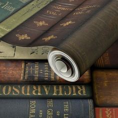 a stack of books sitting on top of each other