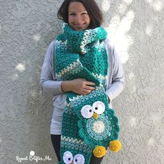 a woman wearing a crocheted owl scarf