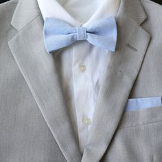 Color:  Sky Blue Imported and Handmade Material:  100% Cotton Adult Necktie Dimensions:  Skinny Width:  2.25 inches   Regular Length:  approx. 58 inches Adult Pre-Tied Bow Tie: approx. 4.75 inch width by 2.5 inch height Necksize 11.5 inches - 20 inches     Metal clasp for secure and comfortable wear. Child Pre-Tied Bow Tie:  approx. 4 inch width and 2 inch height   Necksize 11 inches - 19 inches    Plastic clasp for easy wear and removal. Pocket Square: 9 inches x 9 inches RETURN/EXCHANGE POLICY:  Please notify/message seller regarding an exchange and/or return within 30 days after delivery of package to open a case and we will walk you through the next steps.     CUSTOMER SERVICE:  We strive to provide the best customer service and products to our customers.  Please don't hesitate to cont Light Blue Accessories For Black Tie Event, Light Blue Bow Tie, Bow Tie For Men, Blue Necktie, Groom Ties, Blue Bow Tie, Tie For Men, Boys Bow Ties, Pre Tied Bow Tie