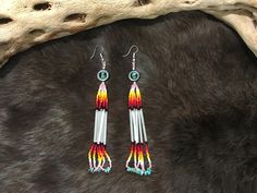 Authentic Beautiful Native American Indian Jewelry Navajo Hand Beaded Long Dangle Earrings with Kingman Turquoise  Great for a gift❤️ Handcrafted by Navajo Artist R. Sellers These beautiful earrings are 5" in length and 1" in width. Southwestern Beaded Fringe Dangle Earrings, Southwestern Style Beaded Fringe Dangle Earrings, Southwestern Adjustable Beaded Fringe Earrings, Southwestern Beaded Fringe Dangle Jewelry, Southwestern Style Dangle Jewelry With Beaded Fringe, Southwestern Style Beaded Fringe Dangle Jewelry, Southwestern Style Beaded Earrings For Festival, Southwestern Adjustable Dangling Bead Earrings, Adjustable Southwestern Beaded Earrings