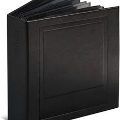 a stack of black folders sitting on top of each other