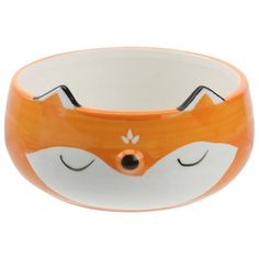 an orange and white bowl with a fox face on it