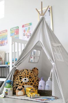 a child's play tent with toys in it