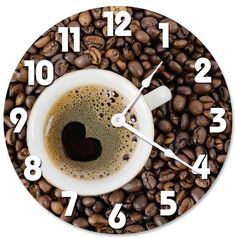 a clock with coffee beans surrounding it