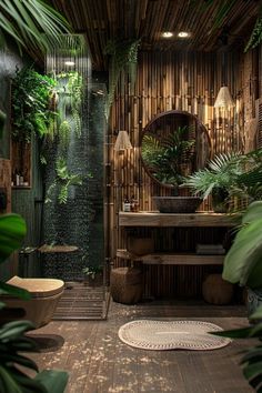 a tropical bathroom with bamboo walls and plants in the shower area, along with a round mirror on the wall