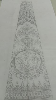 a pencil drawing of a long narrow line with intricate designs on it's sides