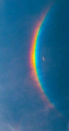 a rainbow colored ring in the sky