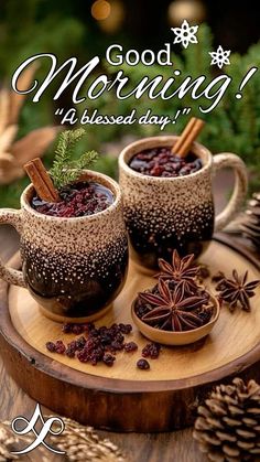 two mugs filled with hot chocolate and cinnamon on top of a wooden tray next to pine cones