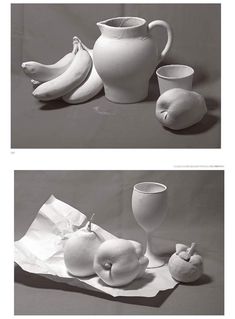 black and white photograph of fruit on table next to pitcher, glasses and vases