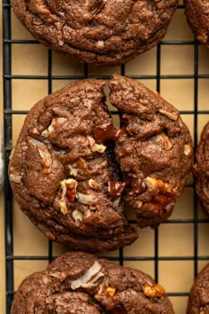 chocolate cookies with walnuts and pecans on a cooling rack, ready to be eaten