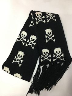 This Fringe Skull Scarf is designed for fearless fashionistas! Choose from a variety of stylish designs and make a statement with its bold skull pattern and classic fringe. Accessorize your wardrobe and show off your daring attitude! ☠️ Description: Size: L180cm including Tassels W15cmScarf Type: Scarf, ShawlScarf Length: >175cmProcess: KnittedPattern Type: GeometricOrigin: CNMaterial: AcrylicItem Type: Scarves Female Skeleton, Shawl Black, Geometric Scarf, Skull Scarf, Skull Fashion, Fringe Scarf, Pashmina Shawl, Puff Sleeve Dresses, Black Fringe