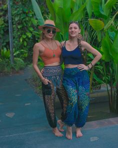 Handmade in Thailand 100% Natural Rayon Model is wearing Elastic Waist Pants in size M/ONE SIZE Machine wash in cold water for best results Our Bohemian Harem Pants are handmade in Thailand with natural rayon and they are very light and comfortable to wear, especially in warm climates as the material breathes well. The pants are perfect for lounging or sleeping at home. They are also great for taking a walk along the beach or practicing yoga anywhere you choose. The designs are very stylish and Festival Pants Bohemian, Blue Stretch Parachute Pants For Summer, Blue Ankle-length Pants For Beach, Blue Ankle-length Beach Pants, Blue Parachute Pants For Summer, Ankle-length Blue Harem Pants For Vacation, Blue Trousers For Yoga, Blue Harem Pants For Yoga, Blue Harem Bottoms With Elastic Waistband